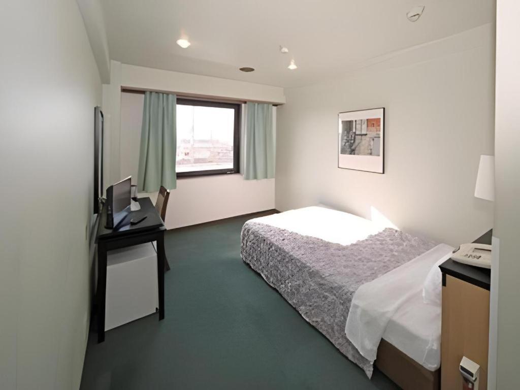 איזומי-סנו Hotel Yutaka Wing מראה חיצוני תמונה